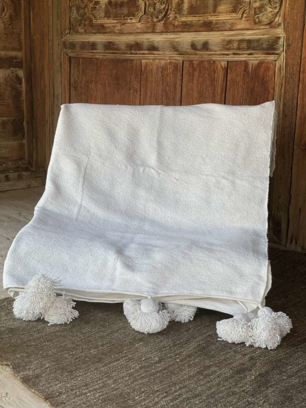 Couverture coton blanc à pompons